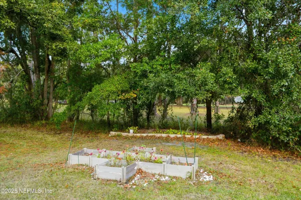 a swimming pool with wooden fence