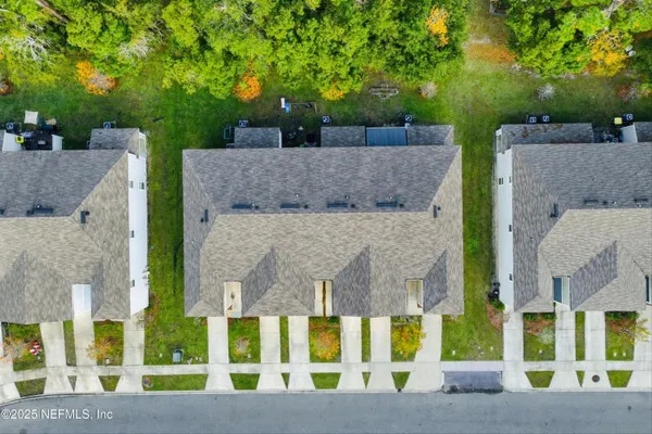 an aerial view of multiple house