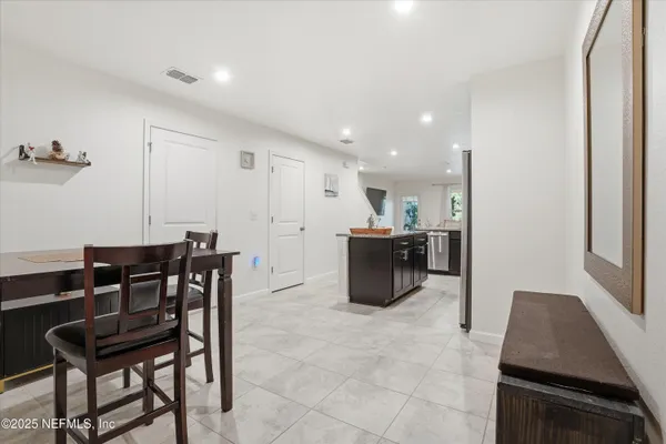 a view of a dining room with furniture