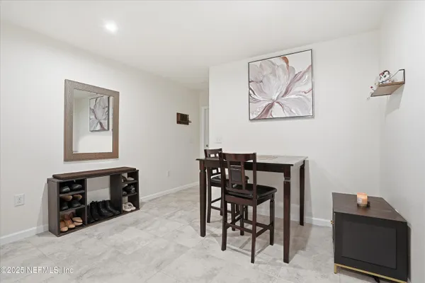 a view of a workspace with furniture