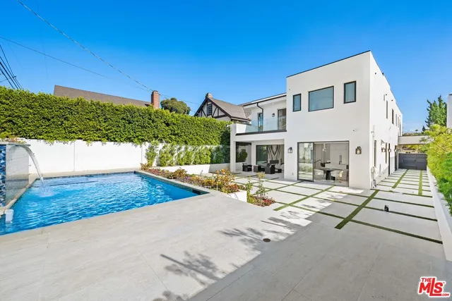 a room with gym equipment and white walls
