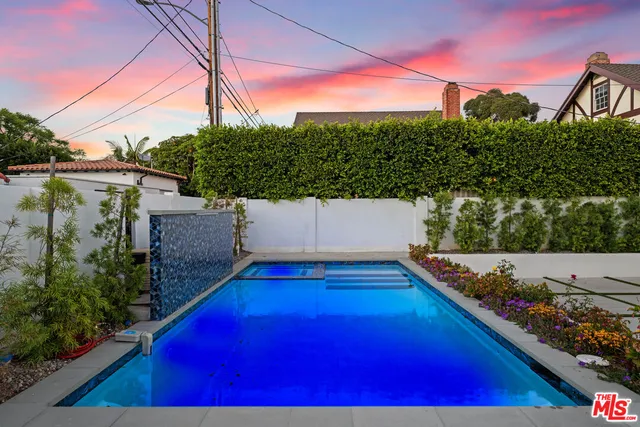 a view of a terrace with wooden benches
