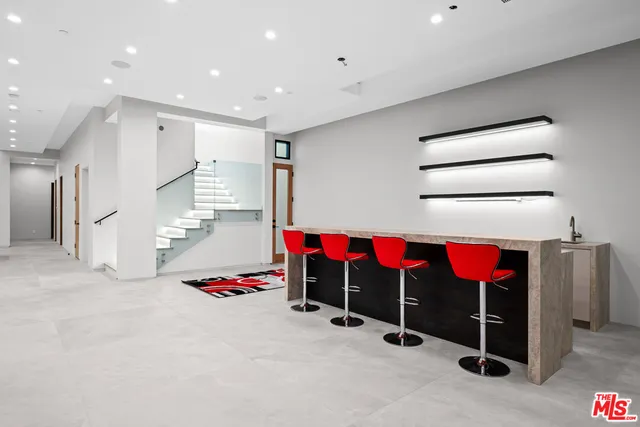 a view of a room with furniture and a fireplace