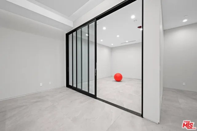 a bathroom with a double vanity sink toilet and shower