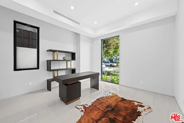 a utility room with sink dryer and washer
