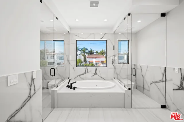 a aerial view of a house with a ocean view