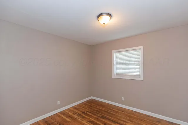 an empty room with a workspace