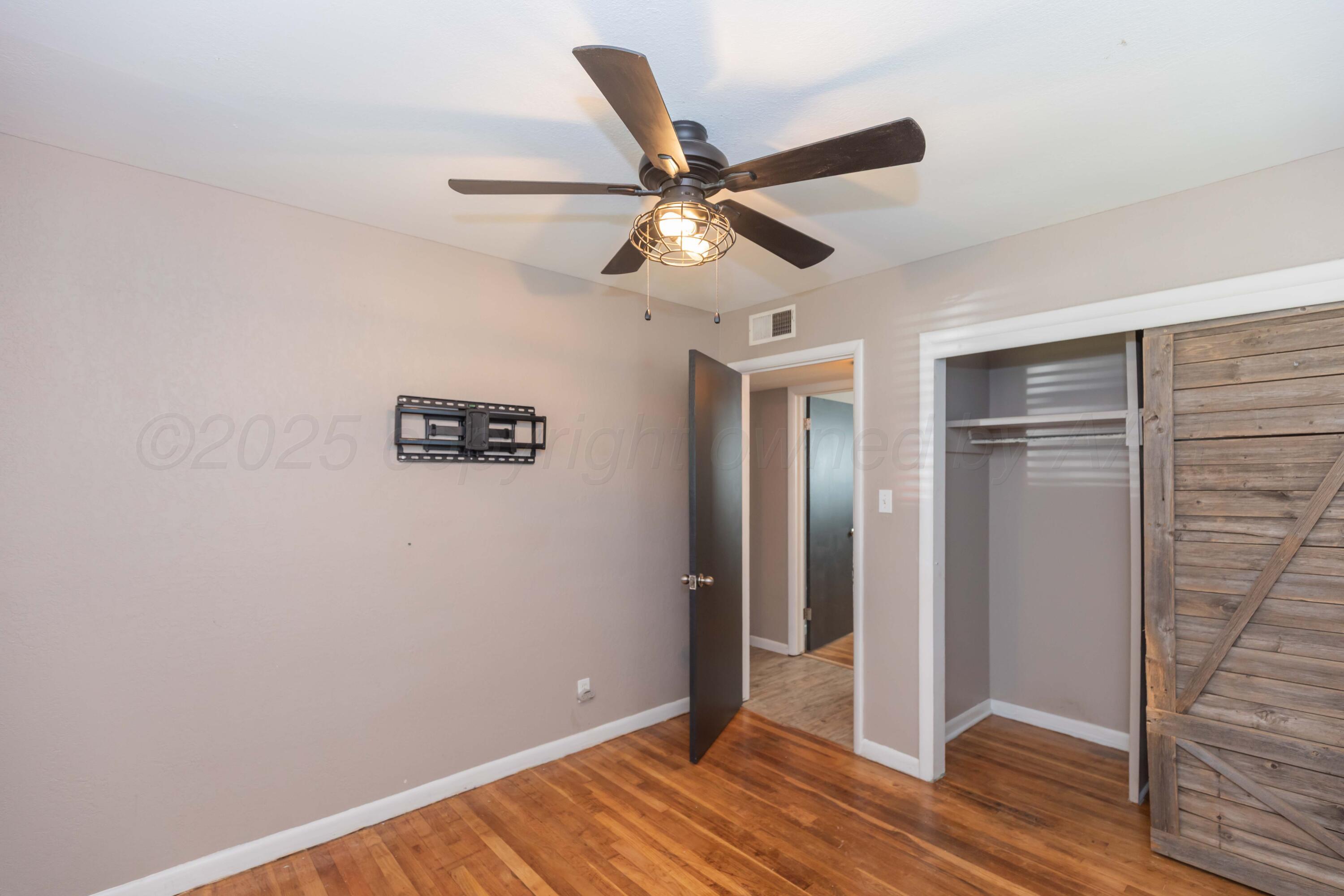 2138 North Sumner Street Pampa, TX 79065 - Photo 26 of 30 a view of a livingroom with wooden floor