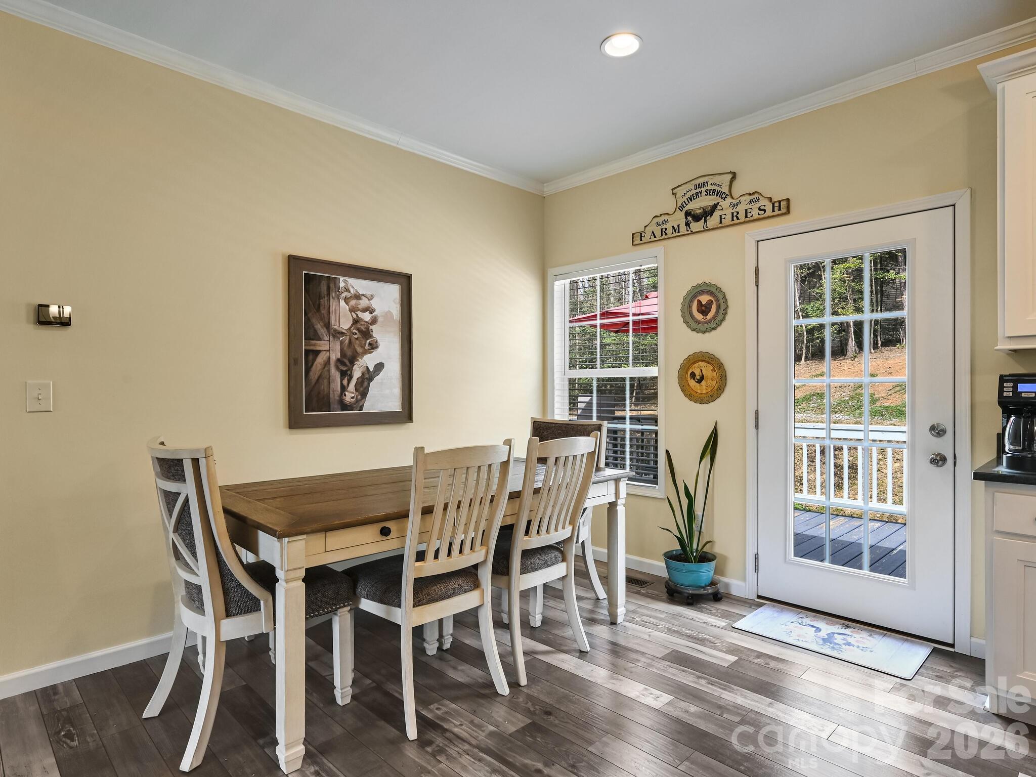 241 West Sunset Ridge Drive Etowah, NC 28729 - Photo 12 of 30 a view of a dining room with furniture and front door