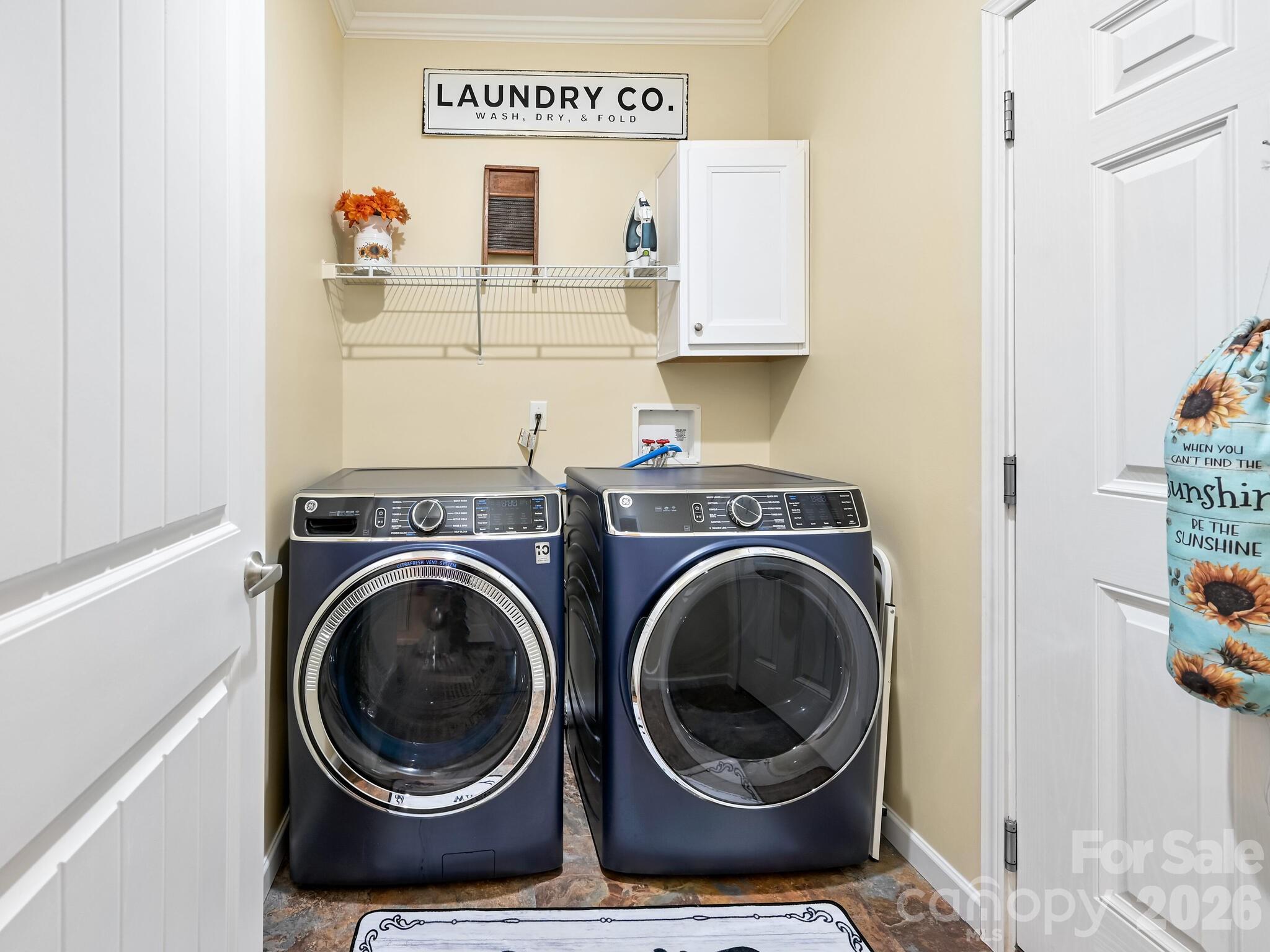 241 West Sunset Ridge Drive Etowah, NC 28729 - Photo 21 of 30 a living room with dryer and washer
