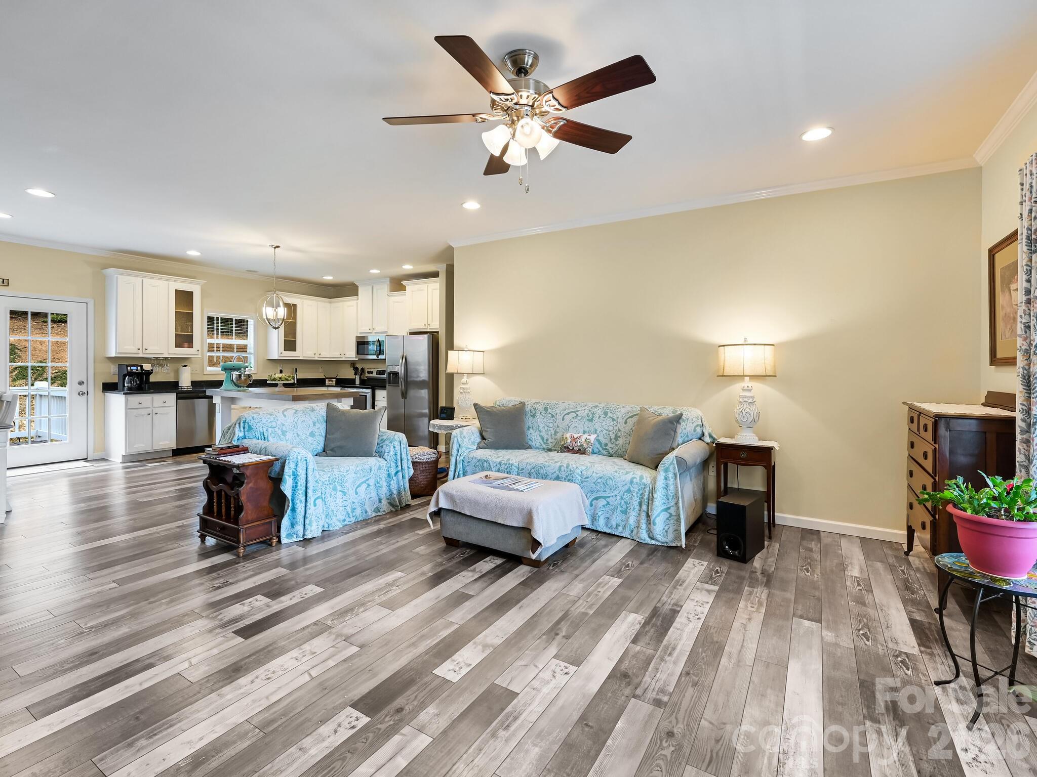 241 West Sunset Ridge Drive Etowah, NC 28729 - Photo 6 of 30 a living room with furniture and kitchen view