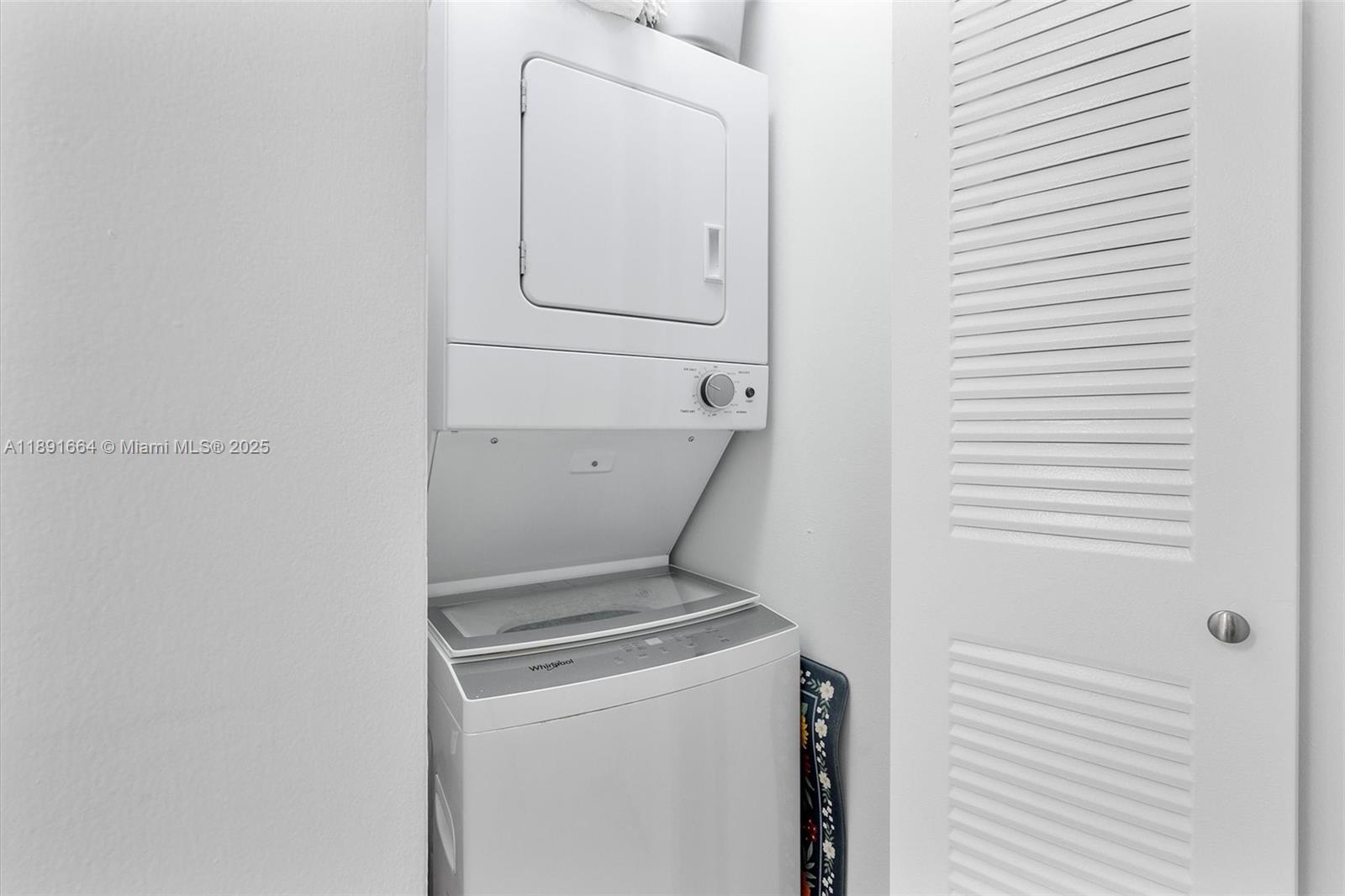 510 South Park Road, Unit 2510 Hollywood, FL 33021 - Photo 8 of 14 a utility room with dryer and washer