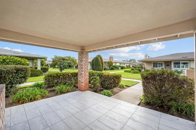 a house view with a garden space