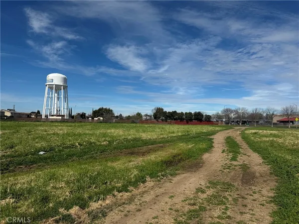 a view of a lake with a building in the background