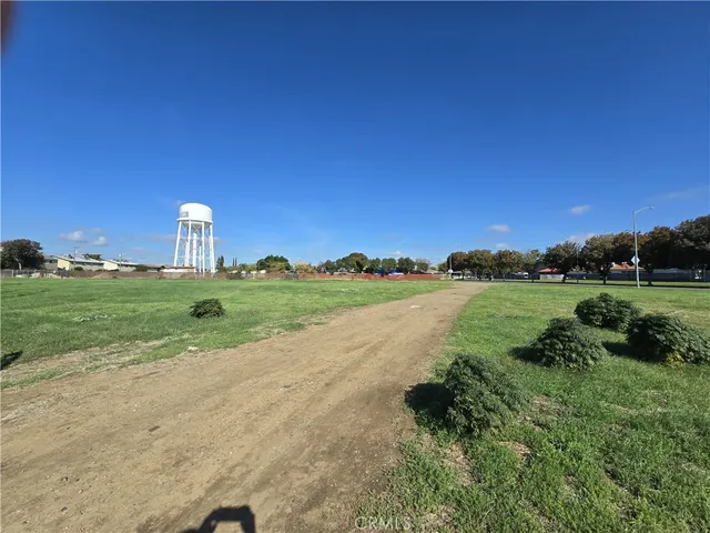 a view of a lake with a house in the background