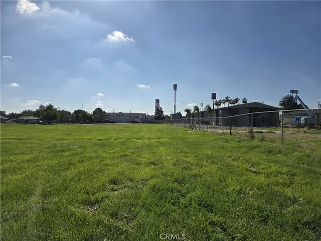 a view of a stadium that has a big yard