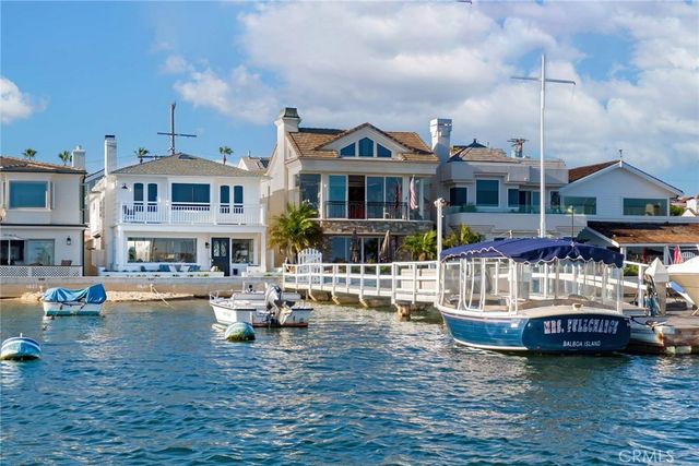 a view of a house with swimming pool