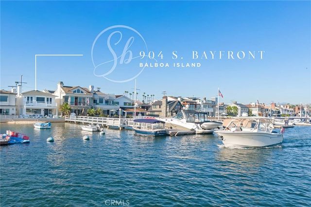 a view of swimming pool with outdoor seating