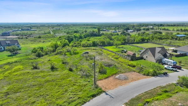 a view of a green field with lots of green space