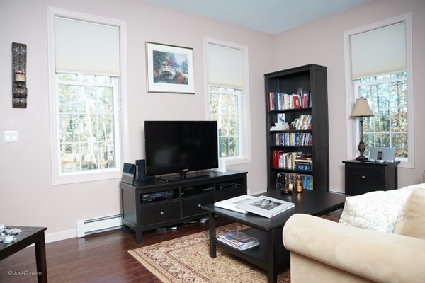 88 Fearing Hill Road Wareham, MA 02576 - Photo 11 of 29 a living room with furniture and a flat screen tv