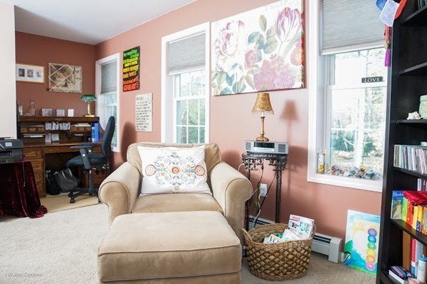 88 Fearing Hill Road Wareham, MA 02576 - Photo 14 of 29 a living room with furniture a flat screen tv and a window