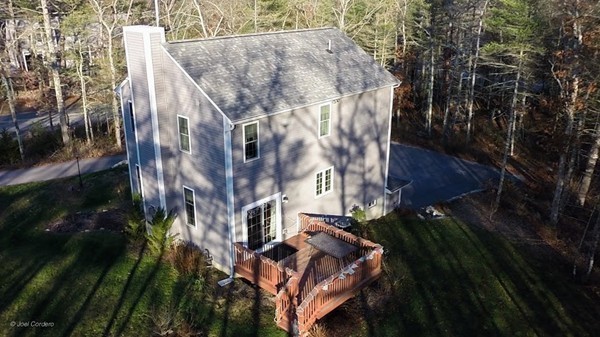 88 Fearing Hill Road Wareham, MA 02576 - Photo 27 of 29 a backyard of a house with lots of green space