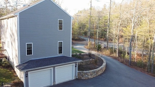 88 Fearing Hill Road Wareham, MA 02576 - Photo 28 of 29 a balcony with table and chairs