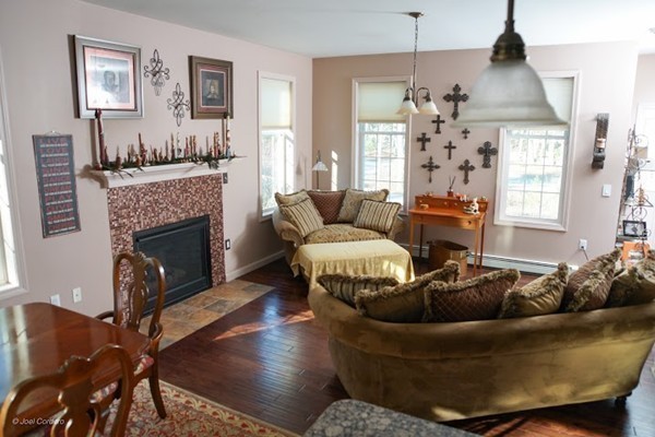88 Fearing Hill Road Wareham, MA 02576 - Photo 9 of 29 a living room with furniture and a fireplace