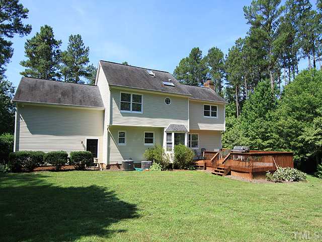115 Equestrian Chase Rougemont, NC 27572 - Photo 12 of 12 a front view of house with yard and outdoor seating