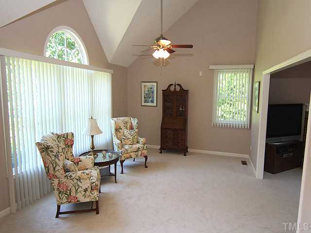 115 Equestrian Chase Rougemont, NC 27572 - Photo 2 of 12 a living room with furniture and a flat screen tv