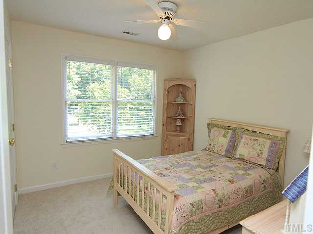 115 Equestrian Chase Rougemont, NC 27572 - Photo 9 of 12 a bedroom with a bed and a window