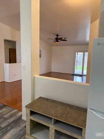 a view of workspace with wooden floor