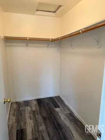 a view of a room with racks on the wall