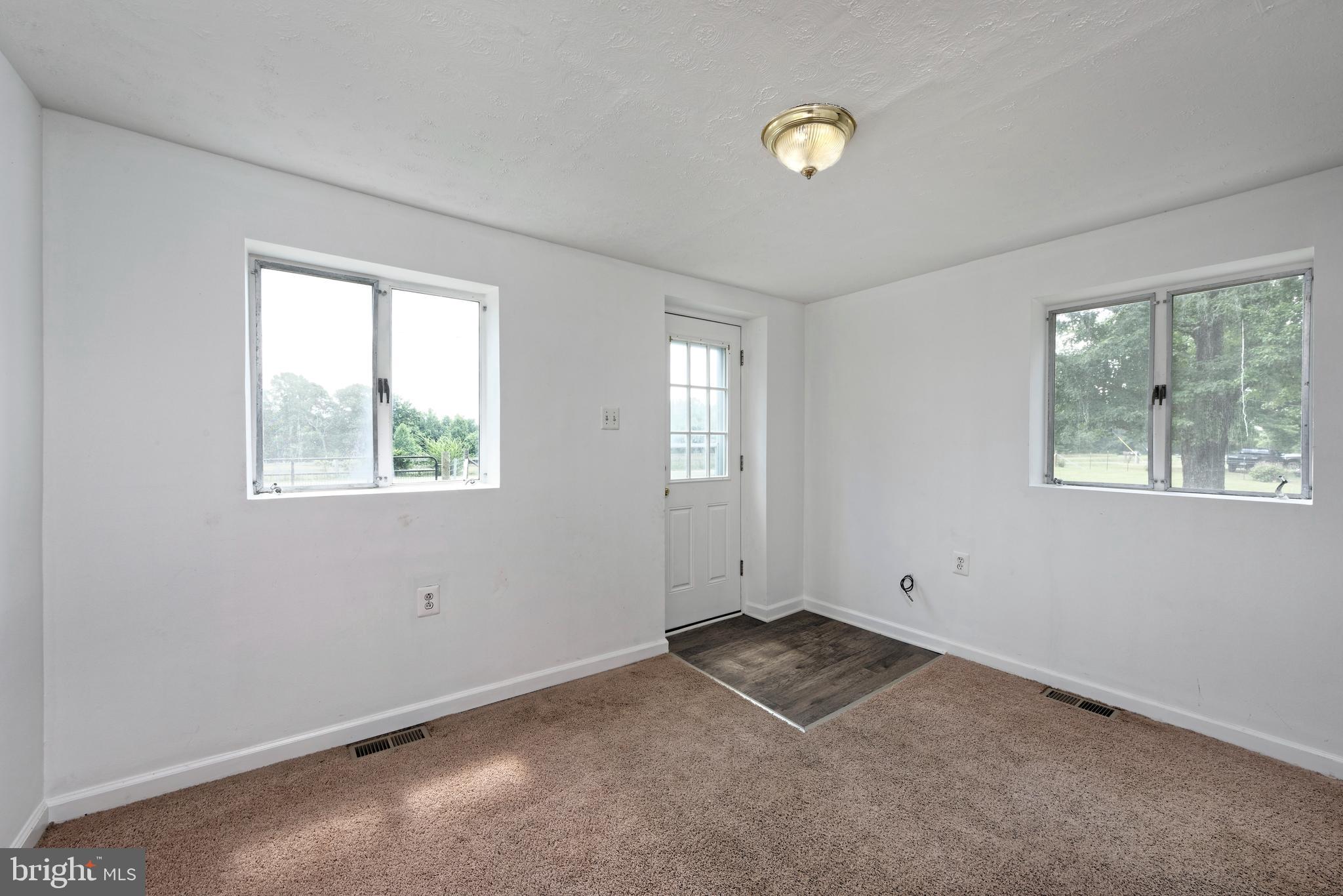 12792 Elk Run Road Midland, VA 22728 - Photo 4 of 18 Enter into the living room with fresh new carpet