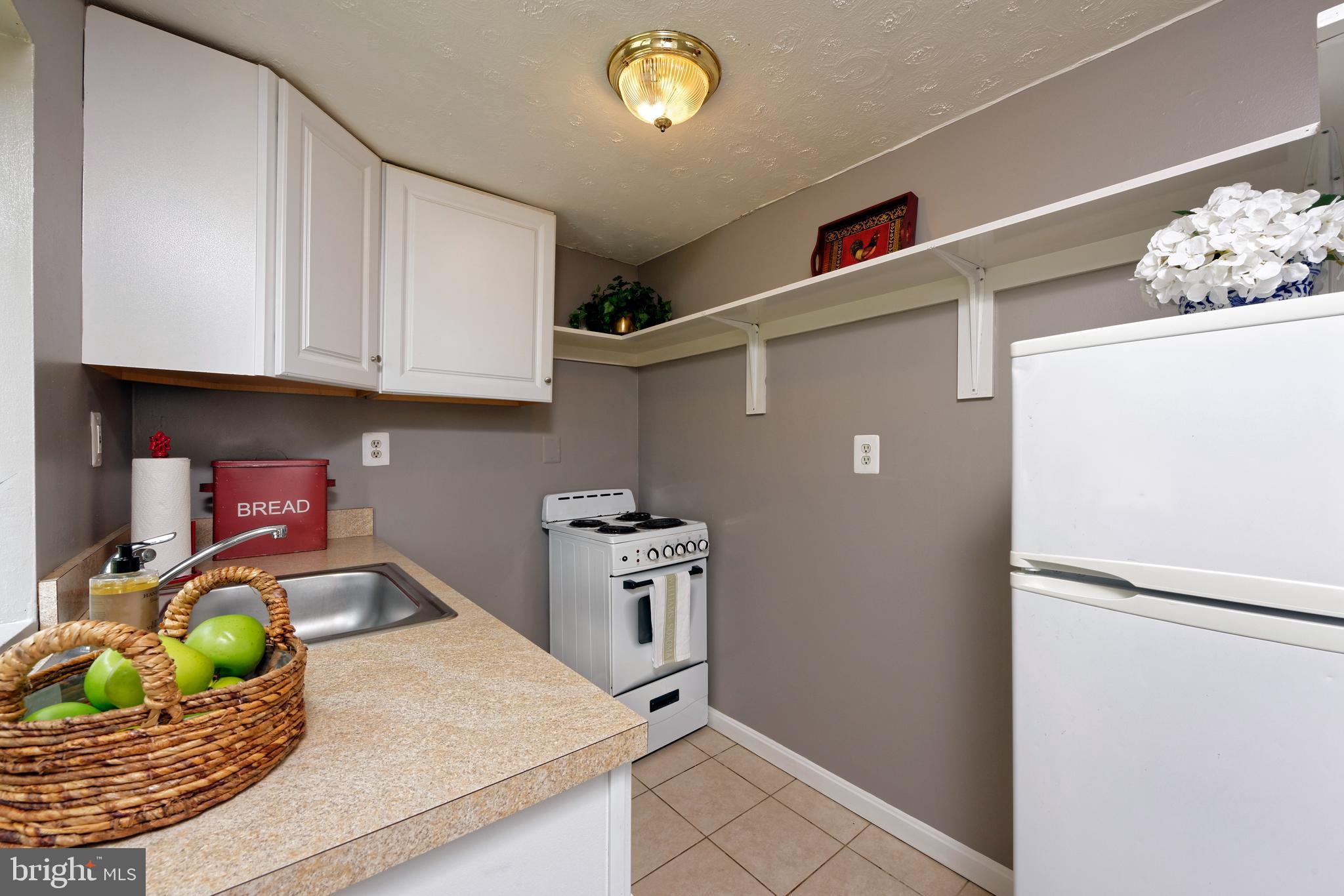 12792 Elk Run Road Midland, VA 22728 - Photo 6 of 18 Country kitchen has stainless sink