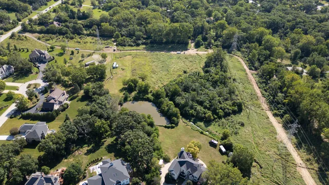 a view of a lake with a house