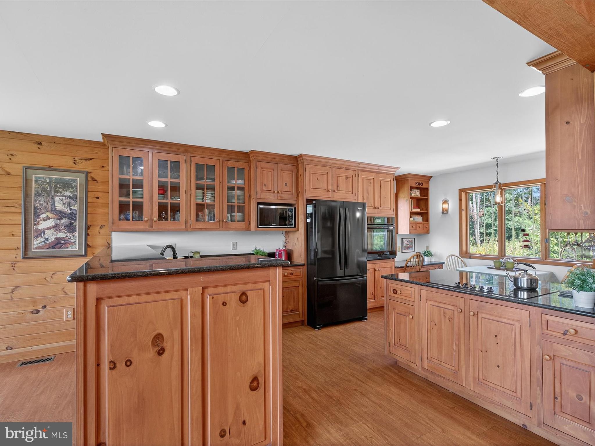 1494 Mountain Road Orrtanna, PA 17353 - Photo 24 of 80 a kitchen with stainless steel appliances granite countertop a refrigerator and a stove top oven