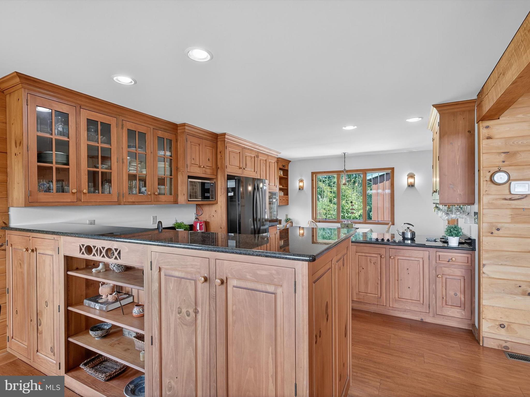 1494 Mountain Road Orrtanna, PA 17353 - Photo 6 of 80 a kitchen with stainless steel appliances a sink stove and cabinets