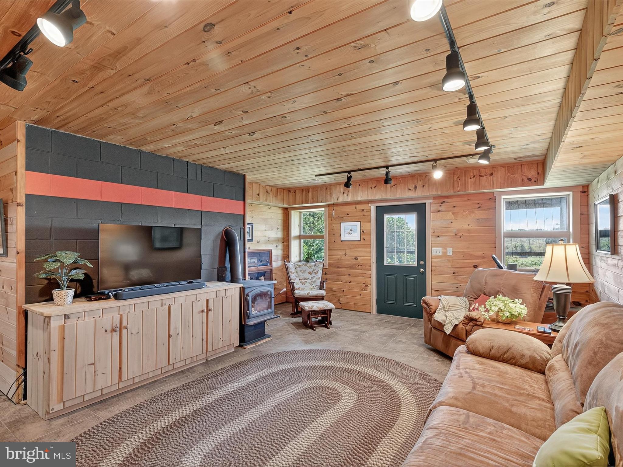 1494 Mountain Road Orrtanna, PA 17353 - Photo 8 of 80 a living room with furniture and a flat screen tv
