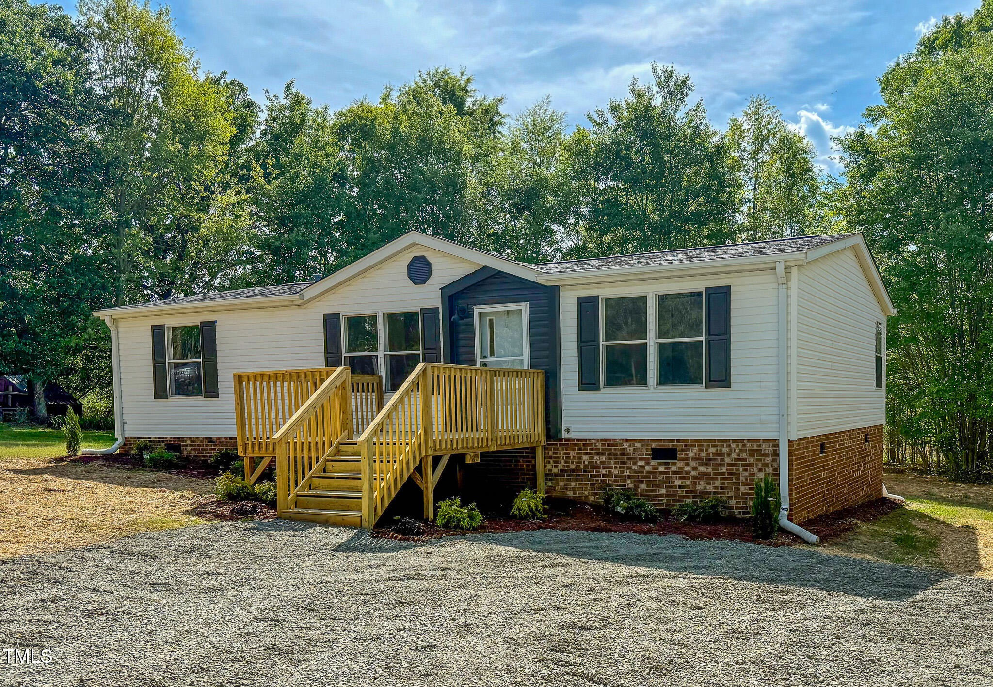 1622 Julian Oakley Road Rougemont, NC 27572 - Photo 1 of 30 a view of a house with a backyard