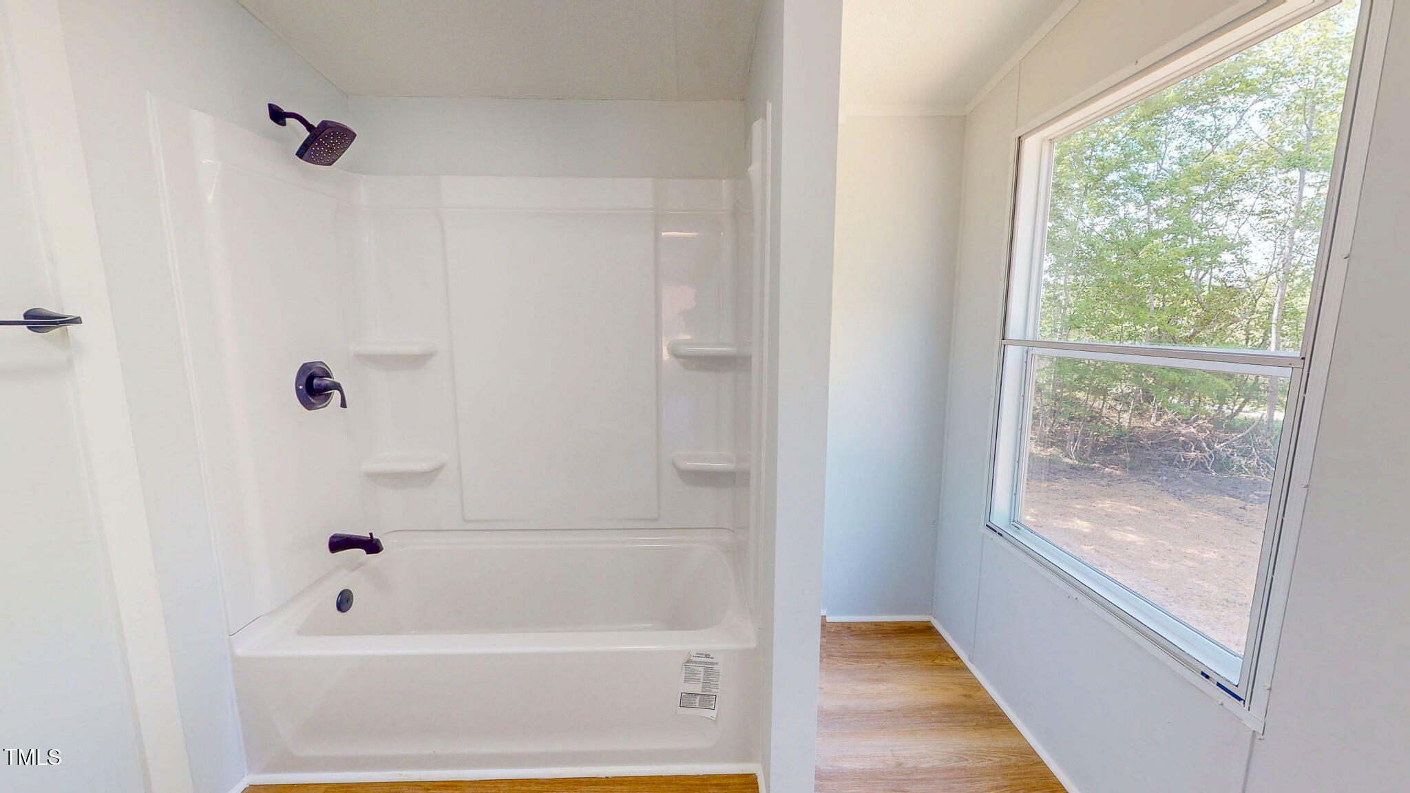 1622 Julian Oakley Road Rougemont, NC 27572 - Photo 14 of 30 a bathroom with a bathtub
