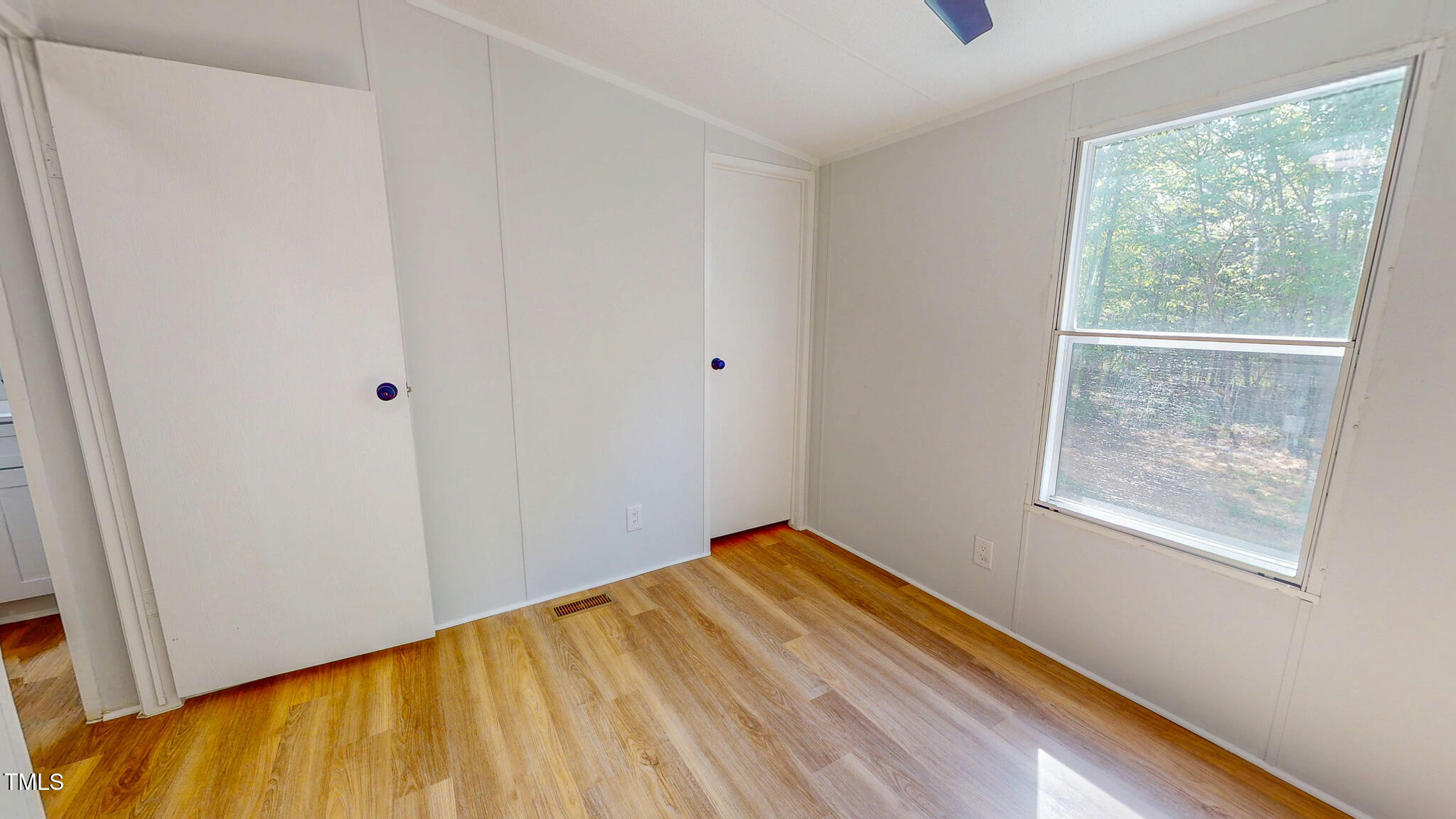 1622 Julian Oakley Road Rougemont, NC 27572 - Photo 24 of 30 a view of a room with wooden floor and walls