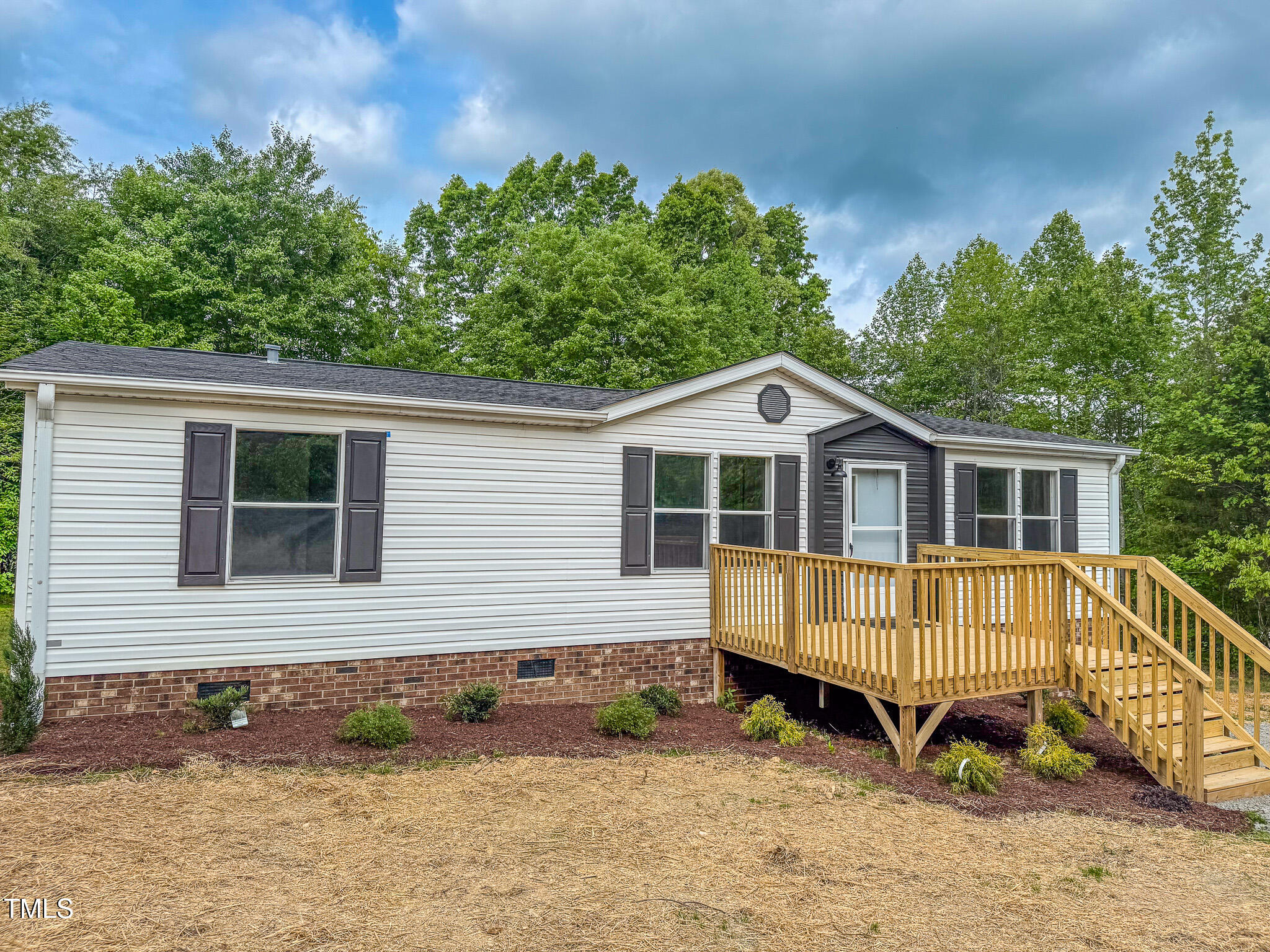 1622 Julian Oakley Road Rougemont, NC 27572 - Photo 5 of 30 a front view of a house with a yard