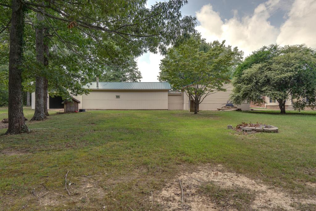 200 Coble Road Hohenwald, TN 38462 - Photo 23 of 29 a front view of house with garden