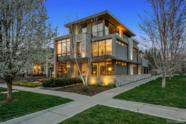 a view of a building with a yard