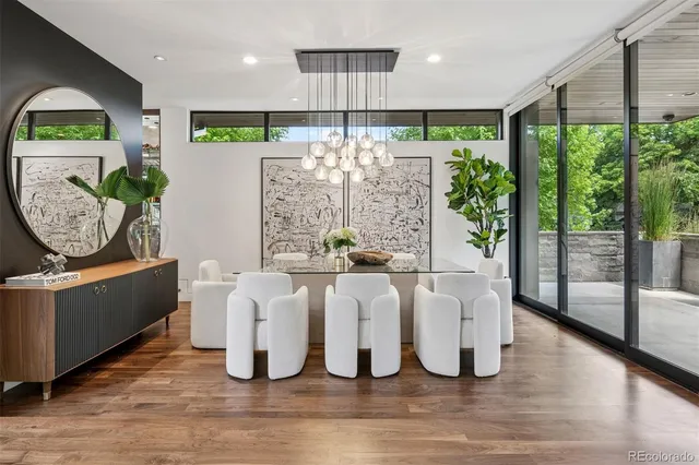 a dining room with large window