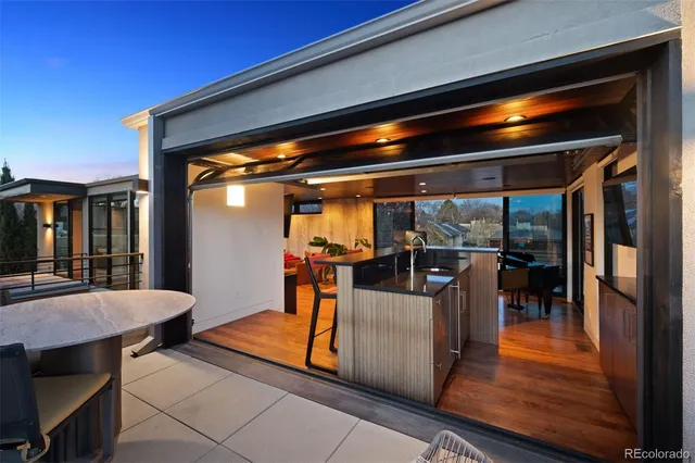 a bedroom with a bed and a potted plant