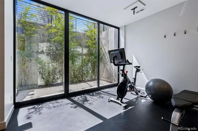 a view of entryway with wooden floor