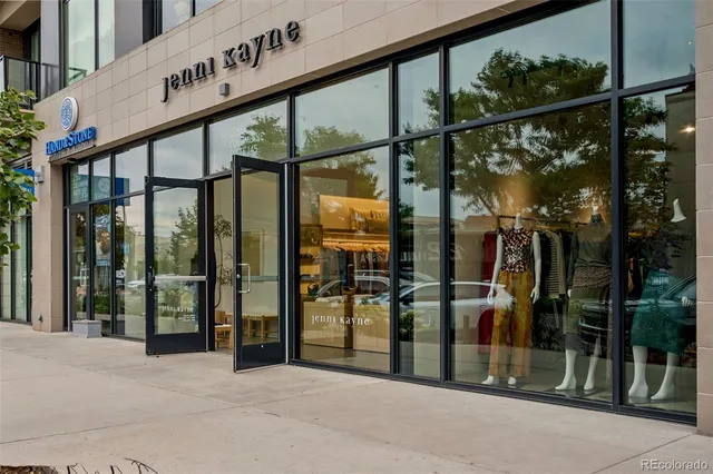 a front view of a house with sitting area