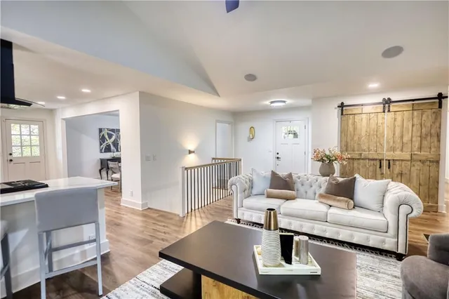 a kitchen with a white cabinets and stove